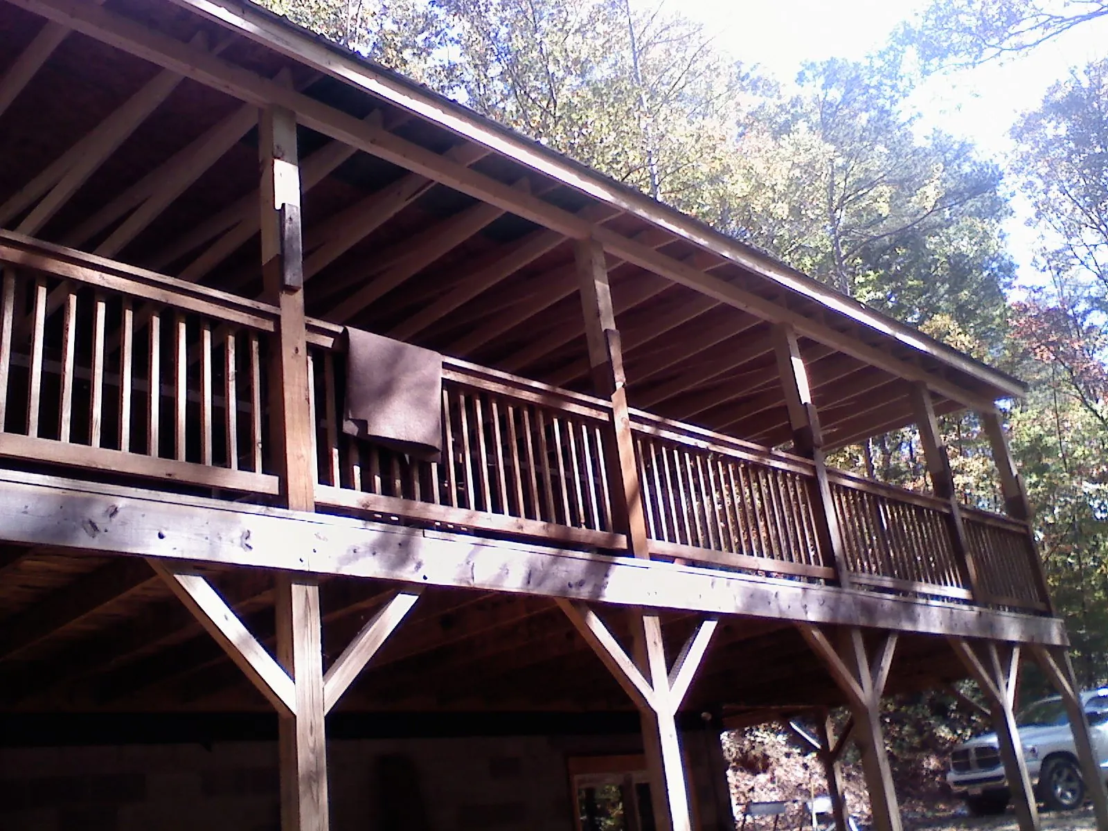 Timber framing under a new elevated porch and deck — Roof Leak Repair in South New Berlin by Roofing Brothers
